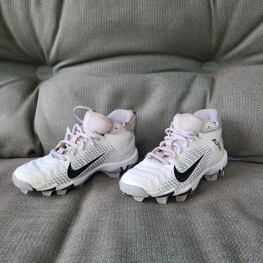 Youth Nike Alpha football cleats. 2Y